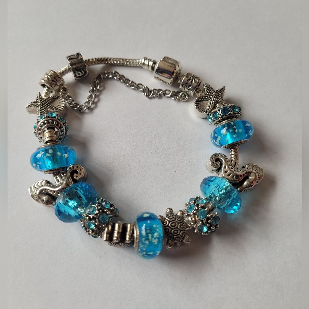 Blue and Silver Tone Ocean Themed Charm Bracelet